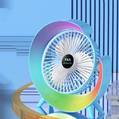 Grass green USB desktop fan with night light on a wooden desk