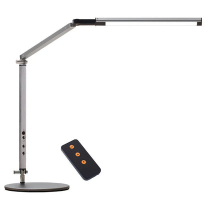 Adjustable aluminium desk lamp with remote control, shown in black with a clip attached to a desk edge.