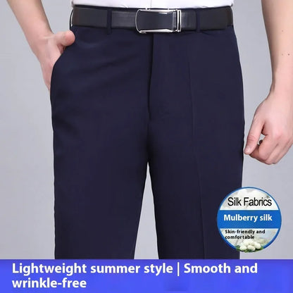 Man wearing dark blue straight-leg non-iron business trousers with a mulberry silk blend fabric.