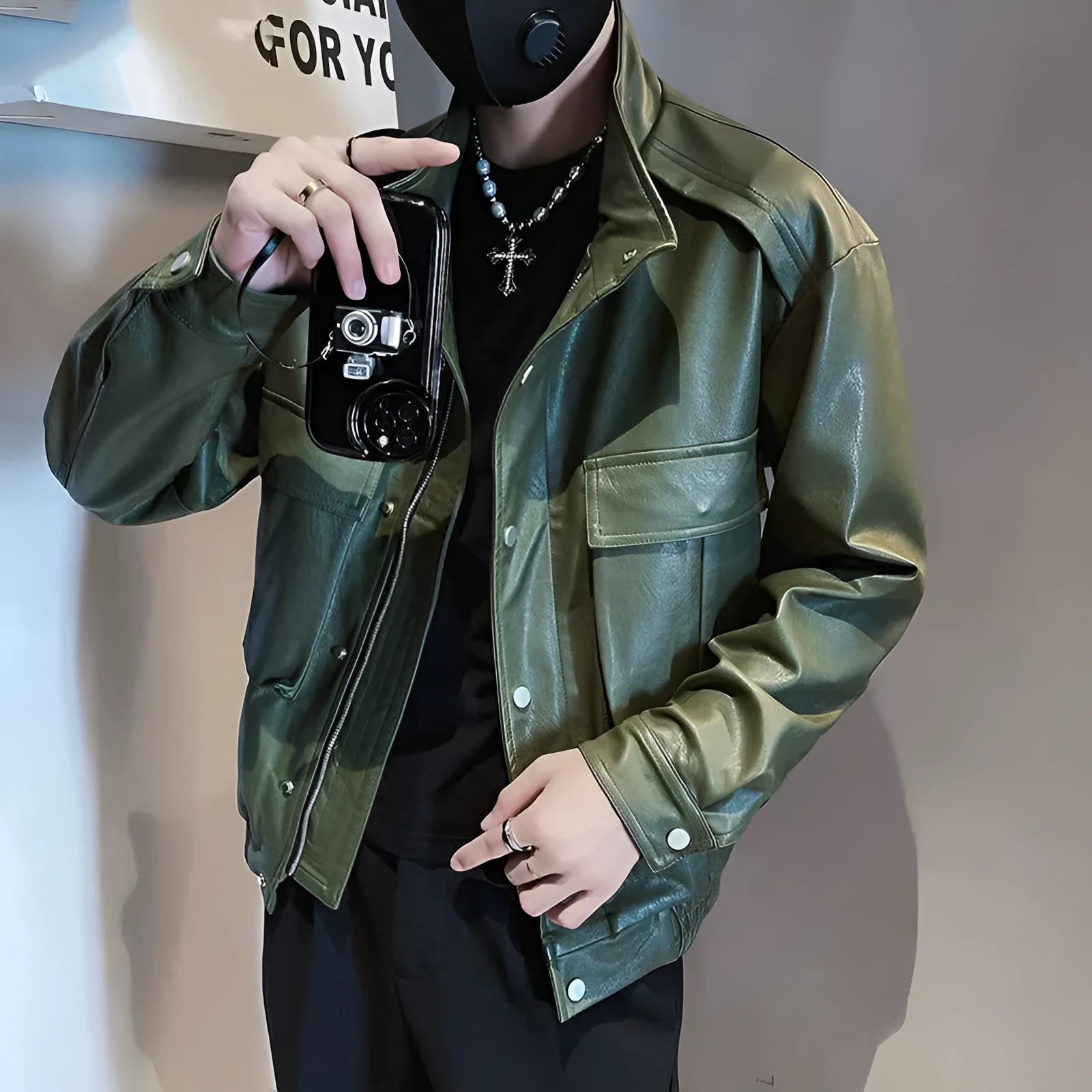 Korean style black PU leather pilot jacket for men with side pockets and straight hem.