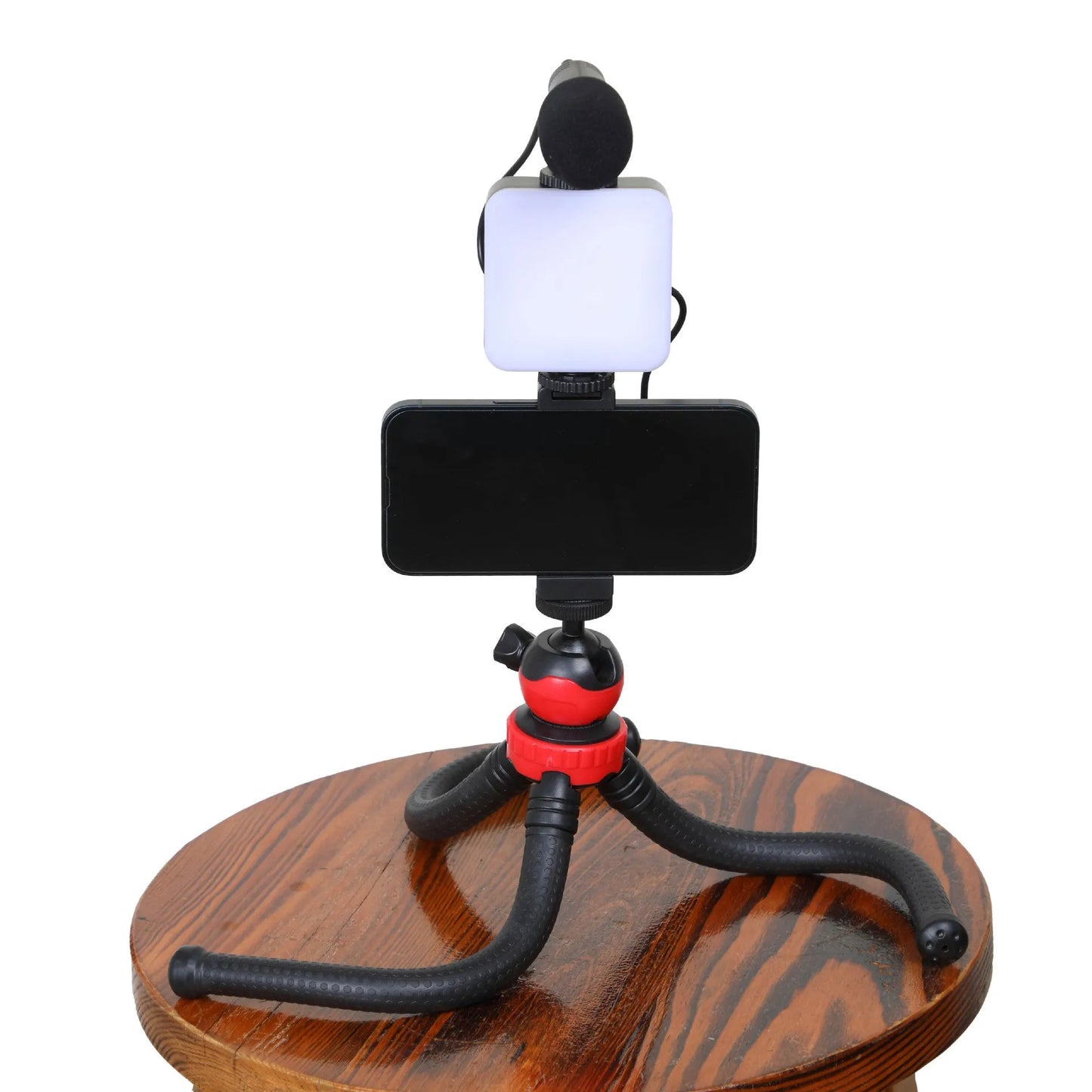 Square LED camera flash with universal hot shoe mount and rotatable head, shown with optional octopus stand tripod.