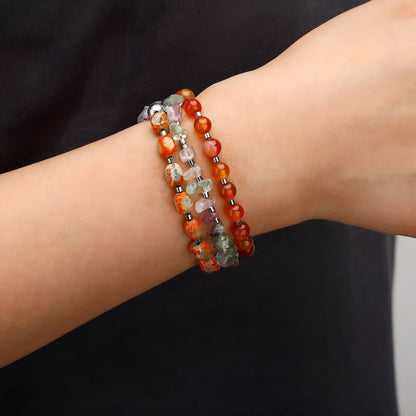 Hand-woven red agate round beads bracelet with geometric shapes and texture design