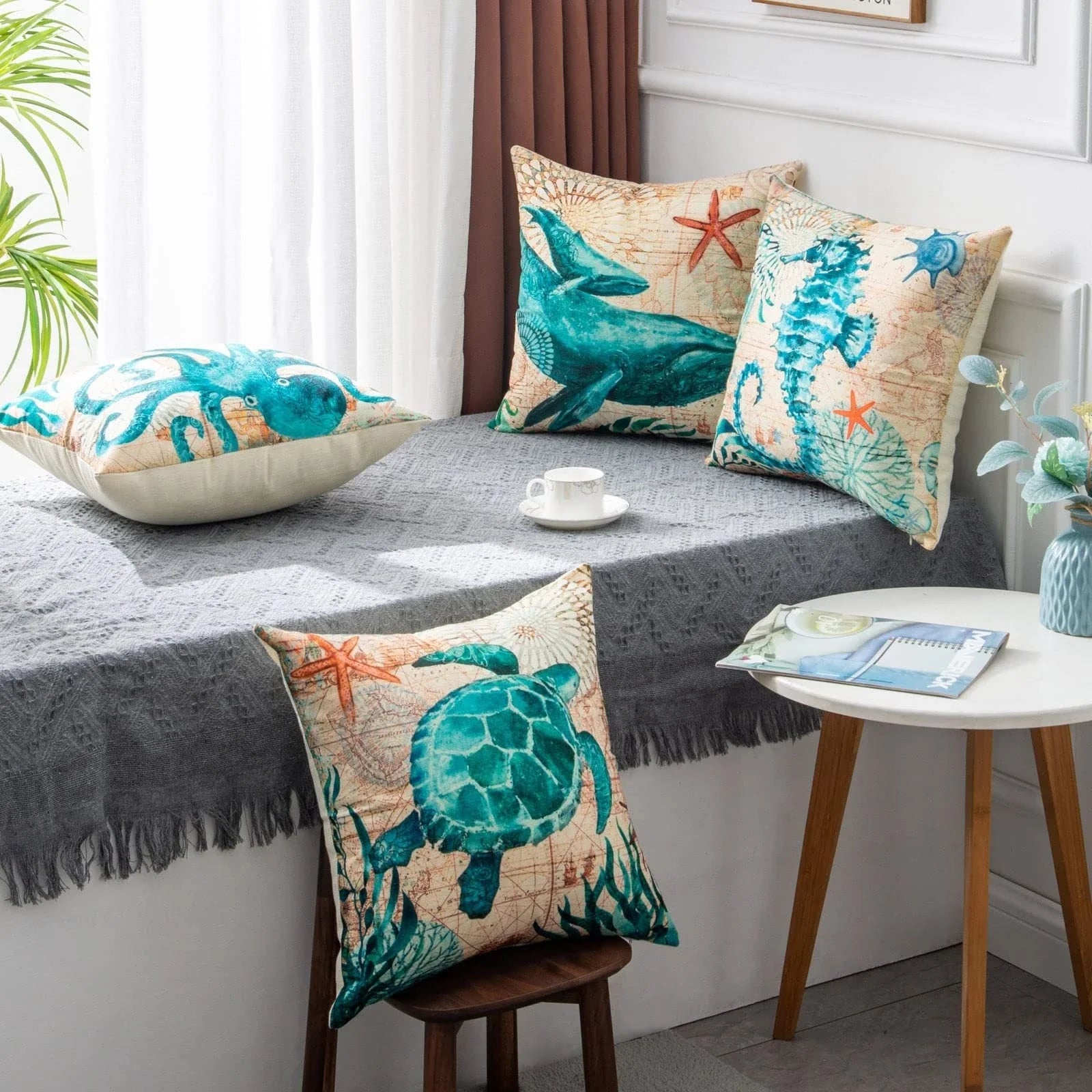 Colorful throw pillow covers featuring vibrant sea creature designs like turtles, octopuses, and seahorses printed on soft, durable linen fabric