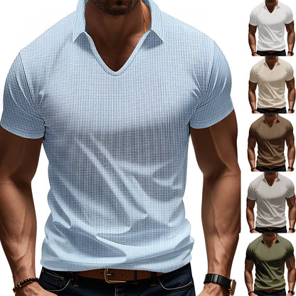 Man modelling a loose-fit apricot coloured V-neck short-sleeve T-shirt for casual summer wear.