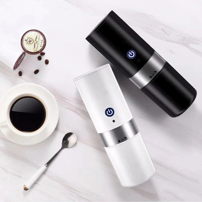 Portable espresso machine with one-touch operation, compatible with coffee capsules and ground beans, for brewing cafe-quality coffee anytime, anywhere.