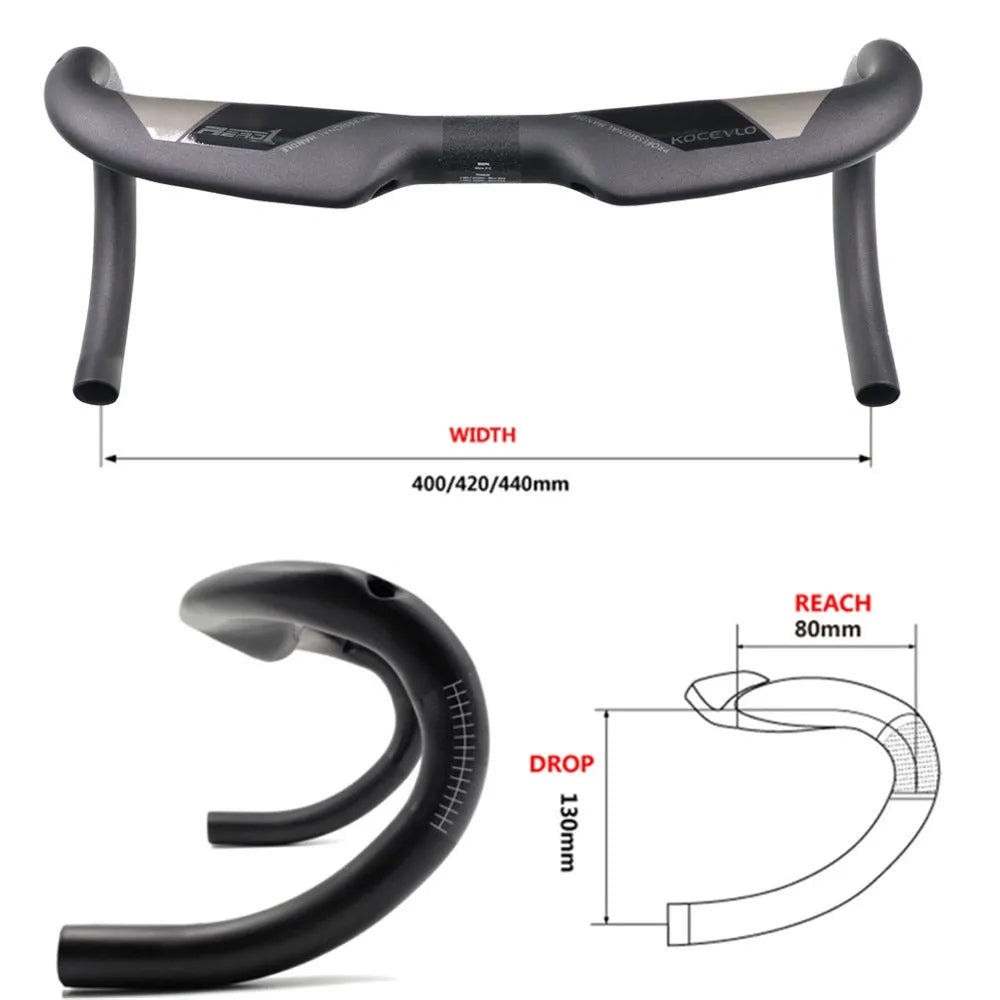 Matt carbon fibre road bike drop handlebar showing bent shape and clamp area.