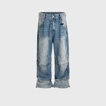 Men's blue washed denim jeans with baggy straight-leg cut and zip fly placket