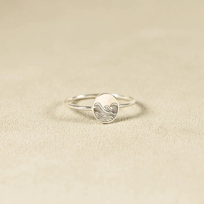 Sterling silver ring with elegant wave-inspired design, inspired by the natural beauty of the British coastline