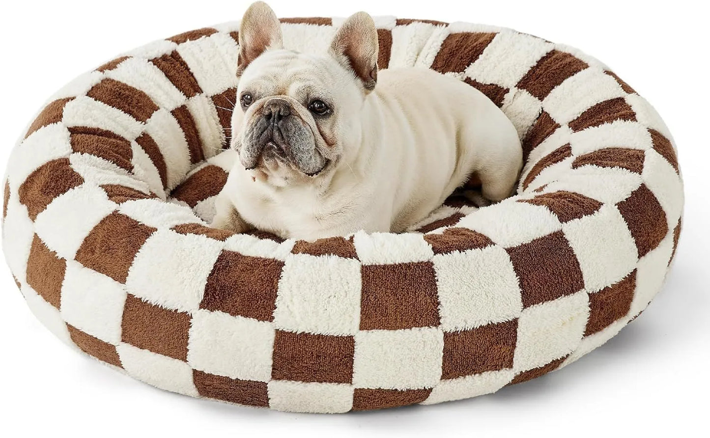 Round blue and white plaid dog bed with plastic sides on wooden floor