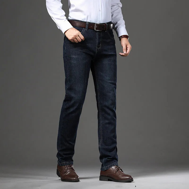 Men's straight-leg stretch jeans in black or blue denim with a zip fly, shown laid flat.