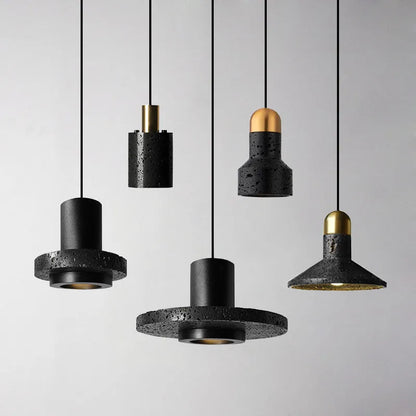 Industrial style iron chandelier with an adjustable hanging cord above a dining table.