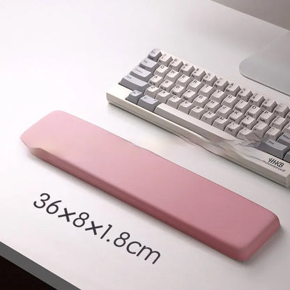 Square cloth-covered silica gel wrist rest mouse pad on a desk.