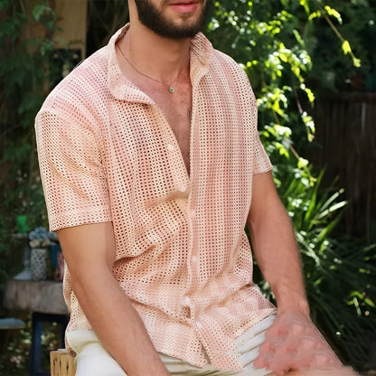 Pink men's short-sleeve waffle-knit shirt with a loose cardigan style on a hanger.