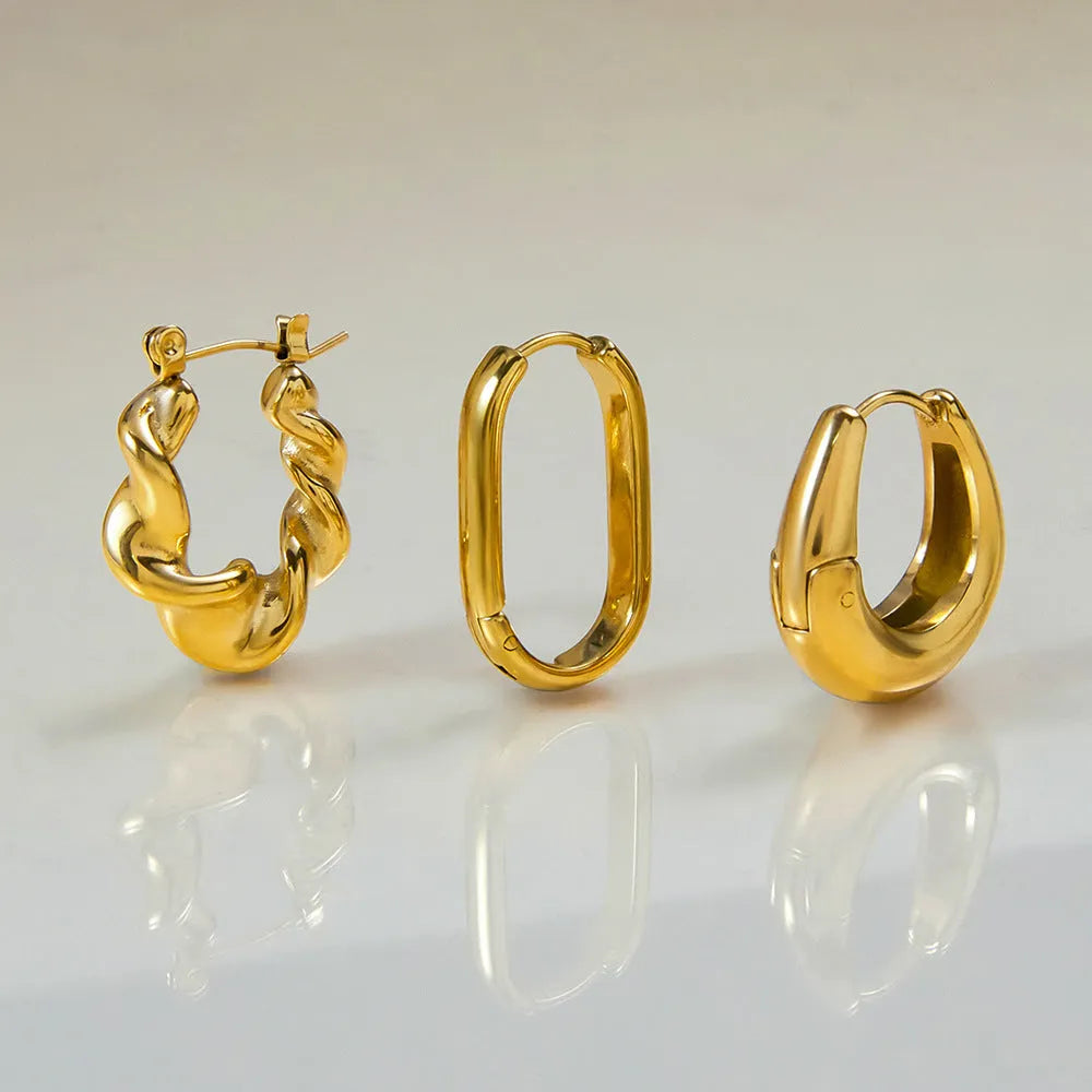 Pair of 18K gold plated stainless steel ear clips with geometric oval ellipse shape for women