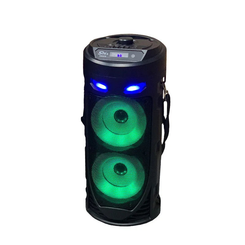 Black portable Bluetooth speaker with dual horn cannon design and wheat-coloured elements