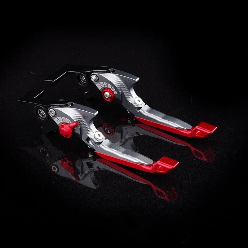 Pair of anodised metal bicycle brake horn handle levers with adjustable reach, shown in a two-tone colour finish.