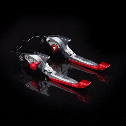Pair of anodised metal bicycle brake horn handle levers with adjustable reach, shown in a two-tone colour finish.