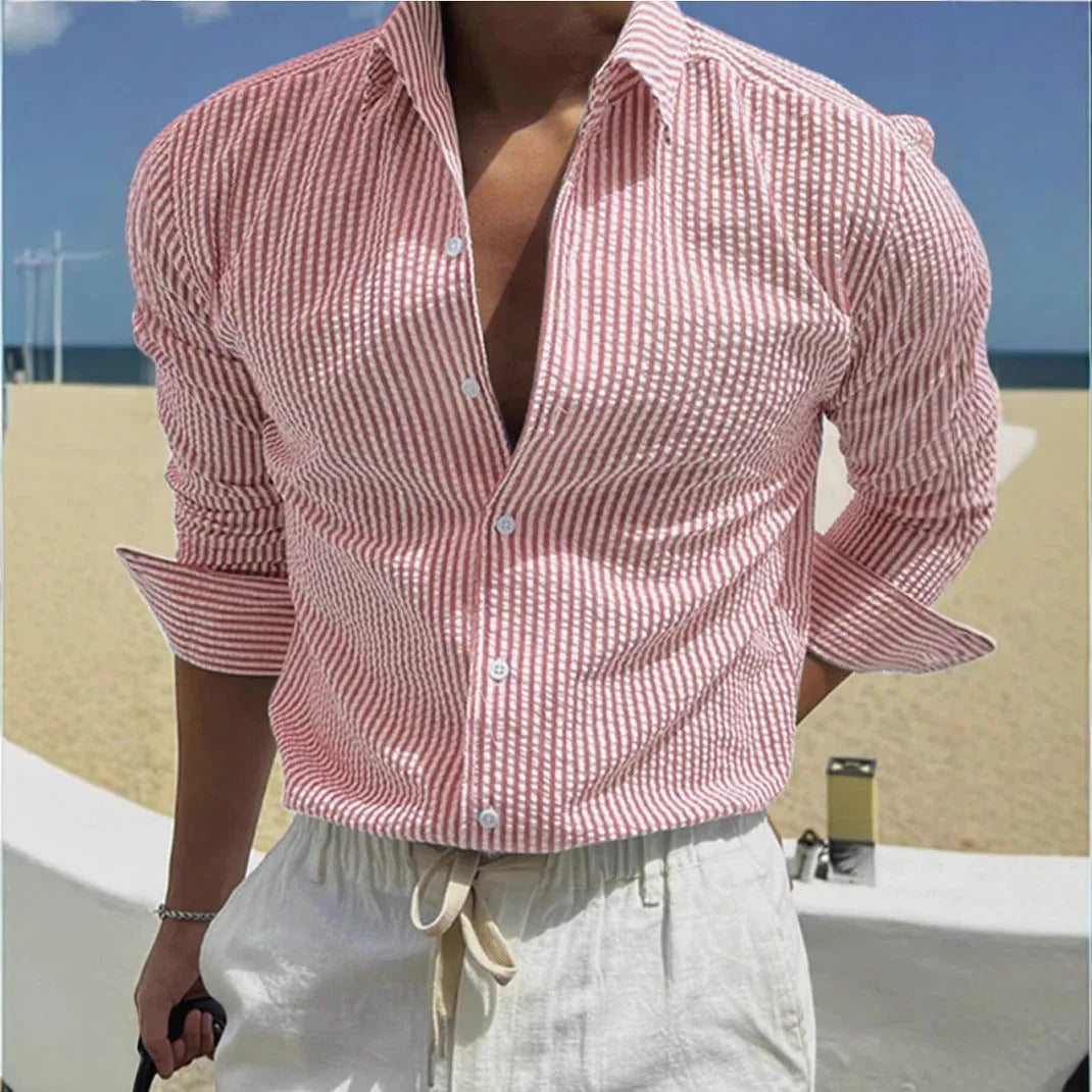 Long sleeve striped shirt with lapel collar on a hanger, shown in a blue colour option.