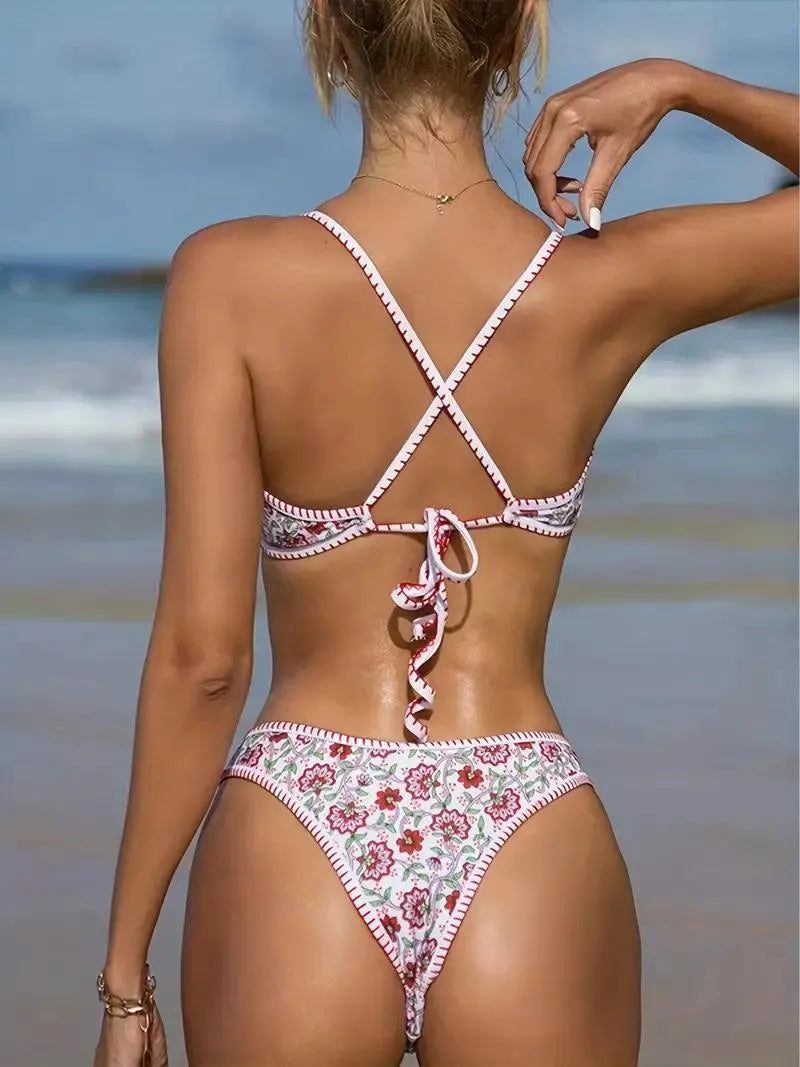 Women's floral embroidered V-neck bikini swimsuit on a mannequin