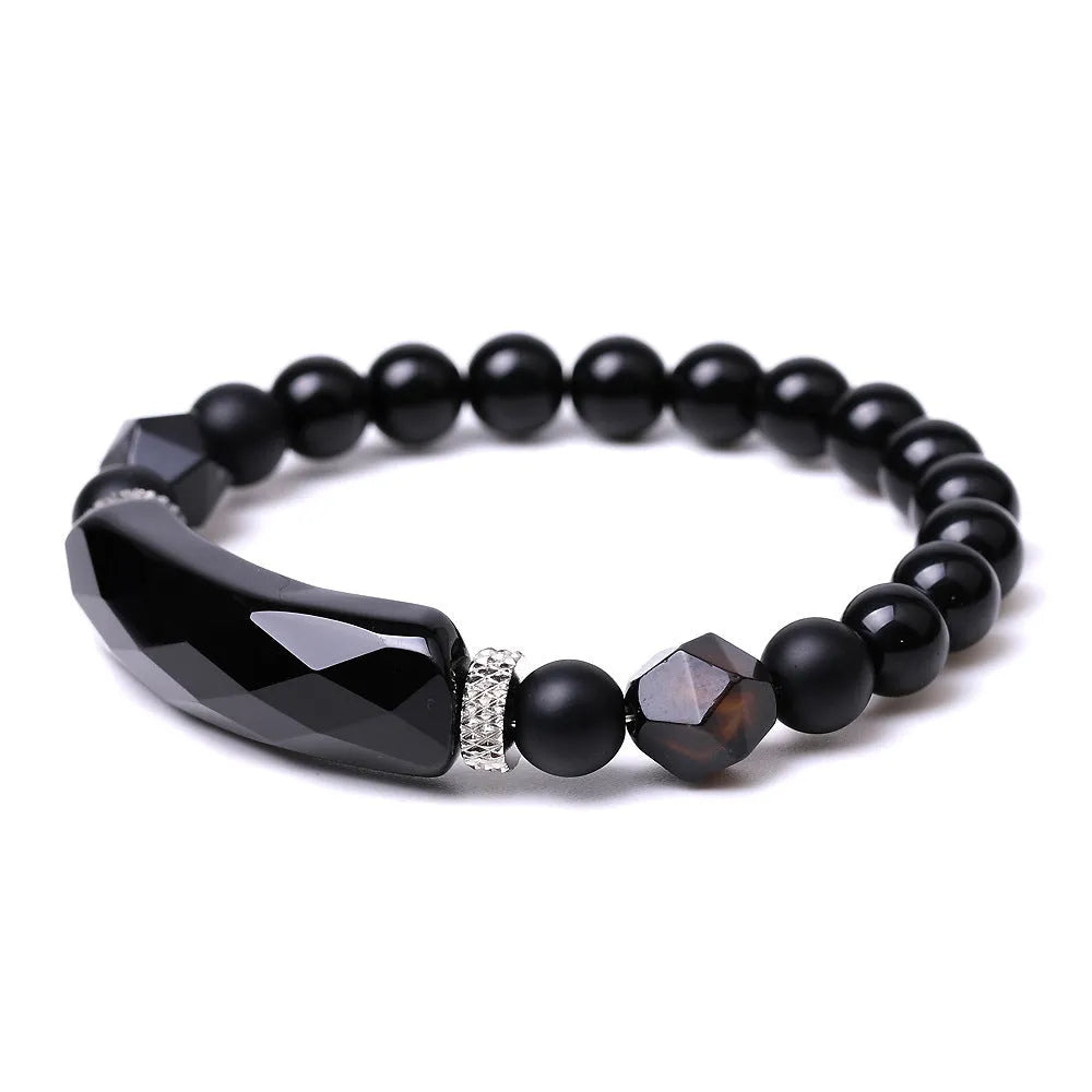 Handmade diamond-shaped cut black agate geometric bracelet showing fan-shaped bead arrangement.