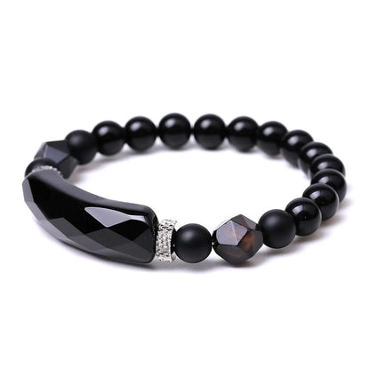 Handmade diamond-shaped cut black agate geometric bracelet showing fan-shaped bead arrangement.
