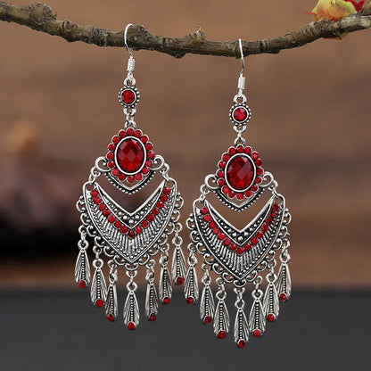 Purple drop-shaped alloy earrings with long fringe and crystal details on a retro style.