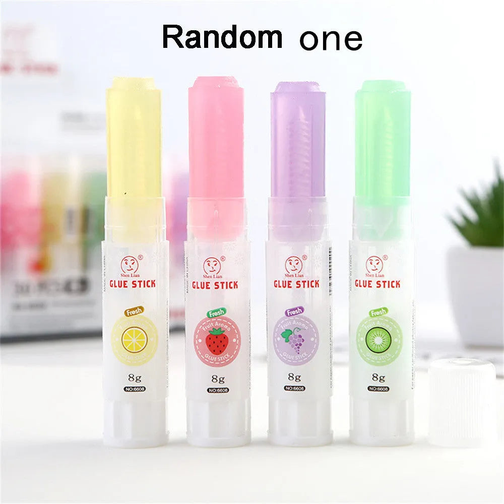 Jelly solid glue stick with fruit scent, 8.5 cm long, for student and craft use.