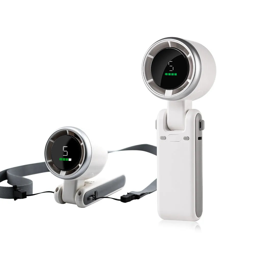 Portable folding mini fan showing adjustable head and compact plastic housing with USB Type-C charging port