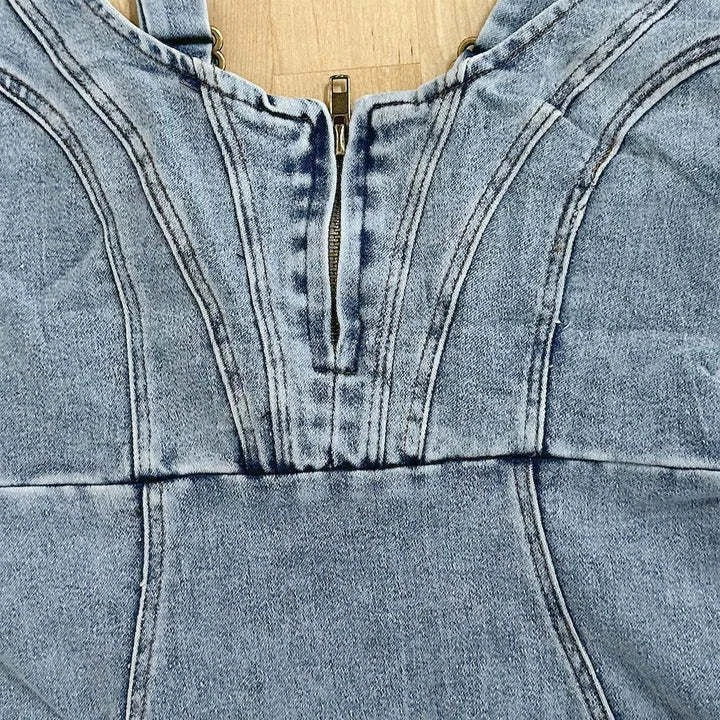 Stylish denim dress with U-neck, suspender design, and slit details for a flattering, casual summer look