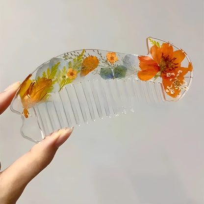 Mirrored glossy resin hair comb in three colour options, measuring under 10cm