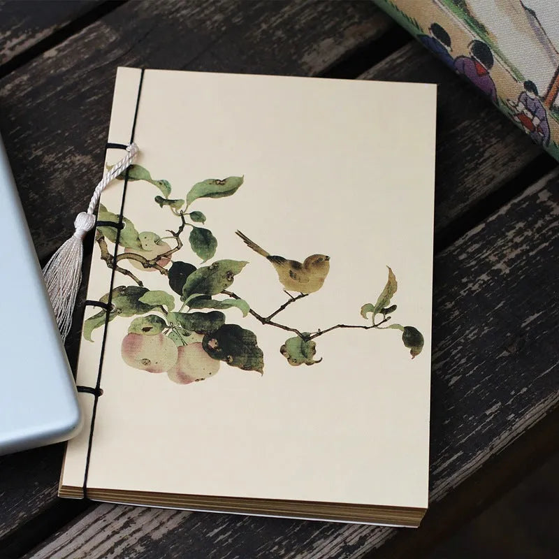 A5 antique wire-bound notebook with classical artwork cover, black oil wax rope binding, and decorative tassels