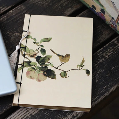 A5 antique wire-bound notebook with classical artwork cover, black oil wax rope binding, and decorative tassels