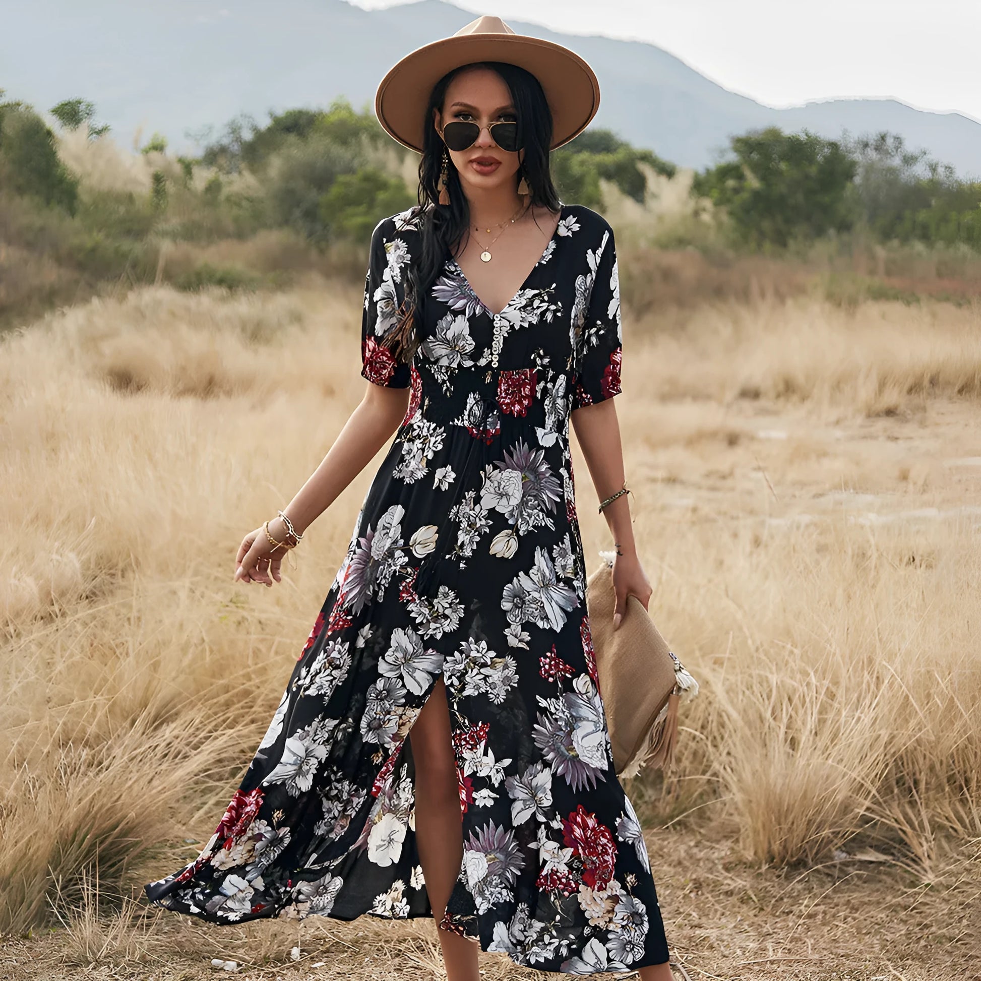 Floral summer beach dress with V-neck, elastic waist, and large hemline in mid-length design