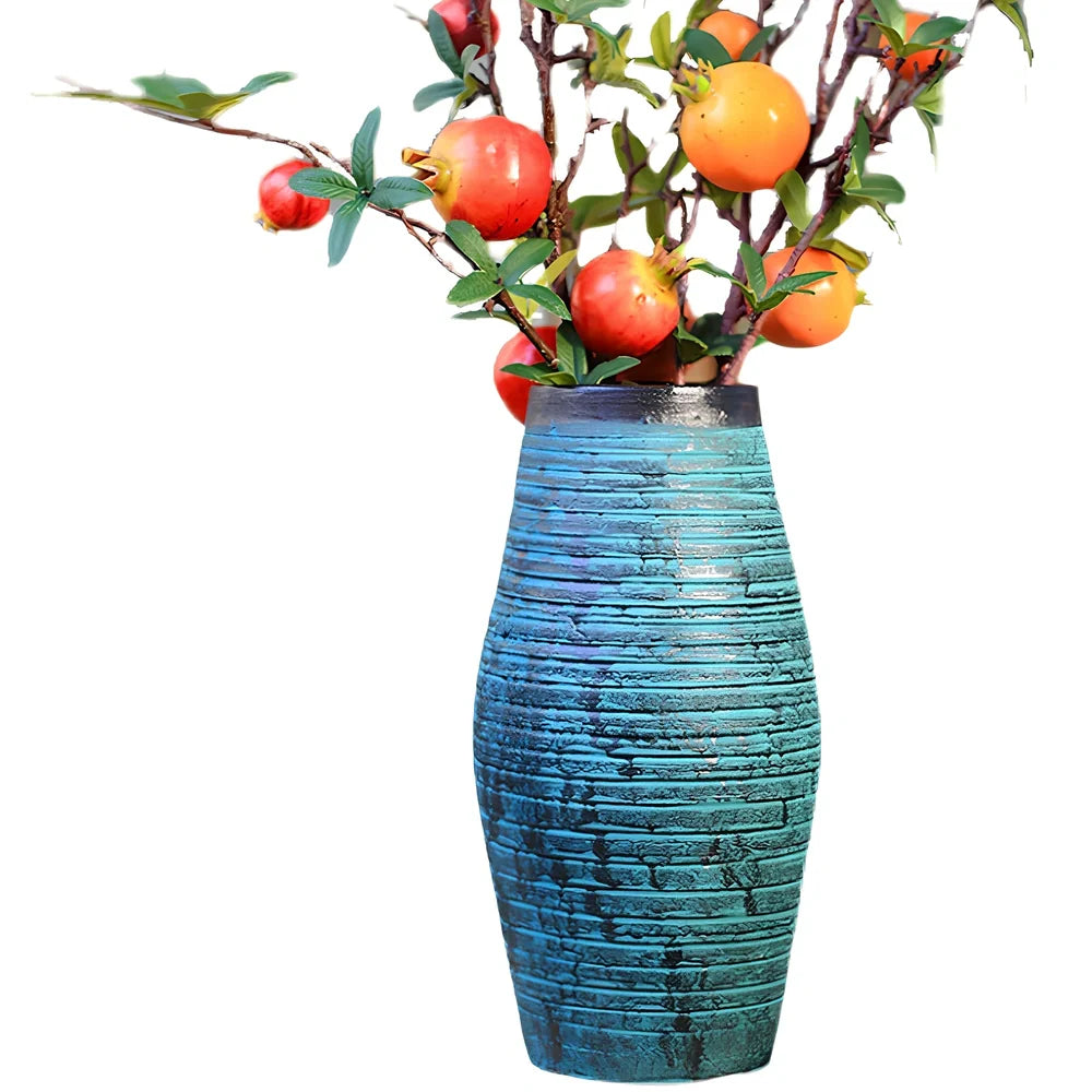 Ceramic mosaic vase with dried flower arrangement, handcrafted surface detailing