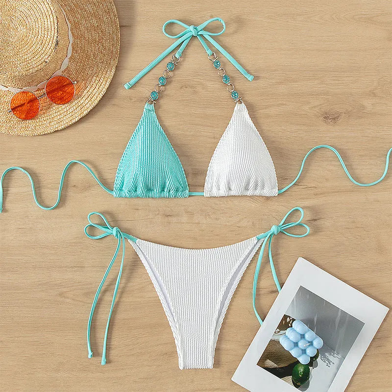 Women's swimsuit with lace-up detail and pearl chain decoration, colour matching design, sleeveless style, available in Asian sizes S, M, L, XL for swimming and wading activities, made from nylon fabric for active use.