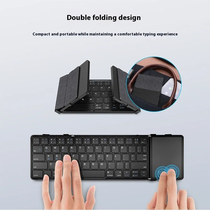 Black portable folding Bluetooth keyboard for tablets and mobile phones, shown folded.