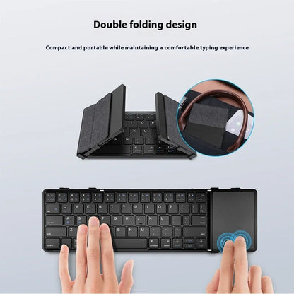 Black portable folding Bluetooth keyboard for tablets and mobile phones, shown folded.