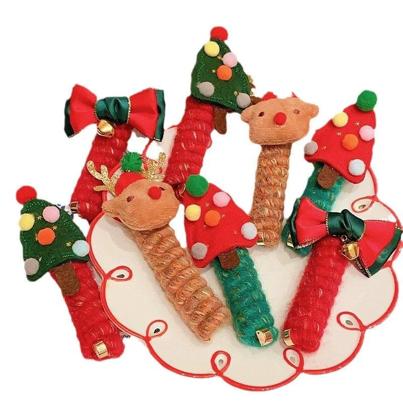 Festive Christmas-themed hair ties with cute designs like bells, trees, and reindeer for kids