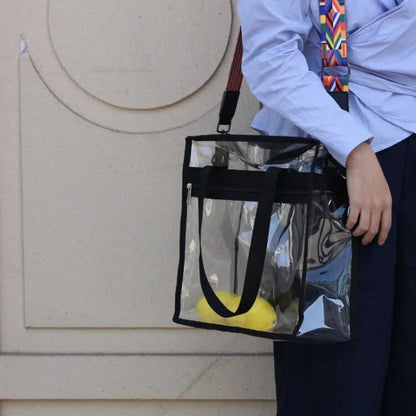 Clear PVC women's messenger bag with a coloured front panel and double shoulder straps.