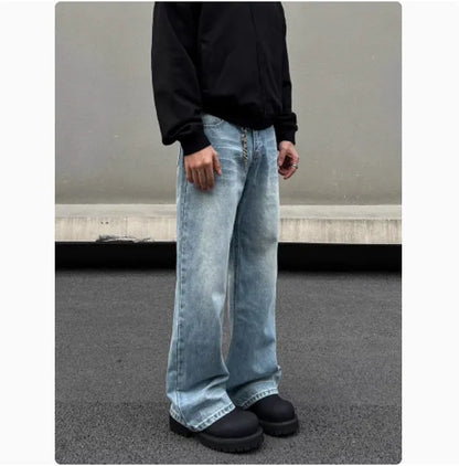 Men's blue straight leg jeans with whisker distressing and flared leg cut