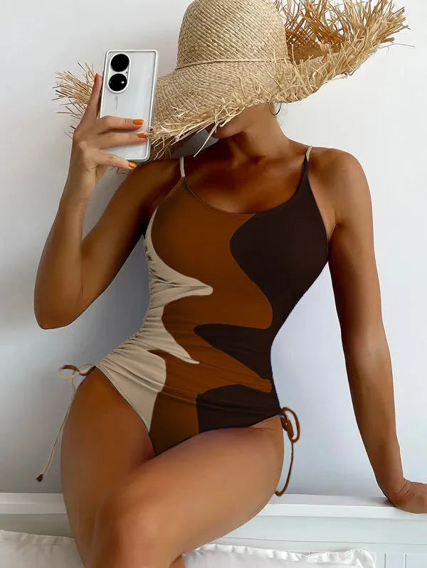Women's sleeveless one-piece swimsuit in a striped print, shown in blue colour.