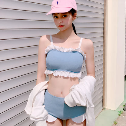 Women's solid colour conservative one-piece swimsuit with top and pants in nylon fabric