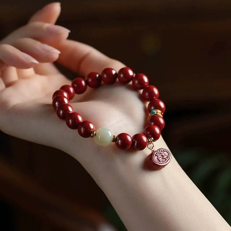 Natural cinnabar emperor sandstone bracelet with Ping An Fu Lu design in 8mm or 10mm size