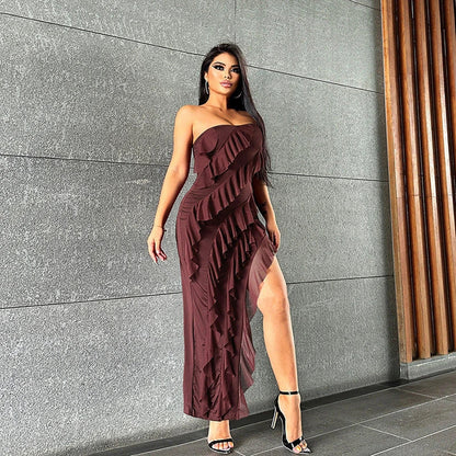 Stylish backless tube top dress with tassel accents in various colors, including black, wine red, red, and brown.
