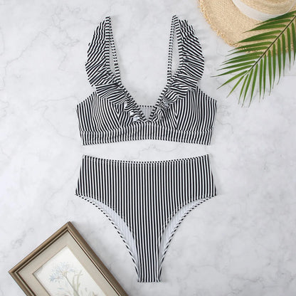 Women's retro striped split chest bikini swimsuit on a hanger