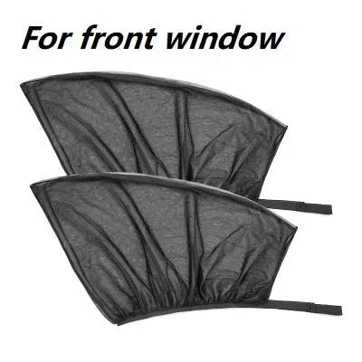 Elastic car side window sunshade made of grey mesh, stretched over a car window frame.