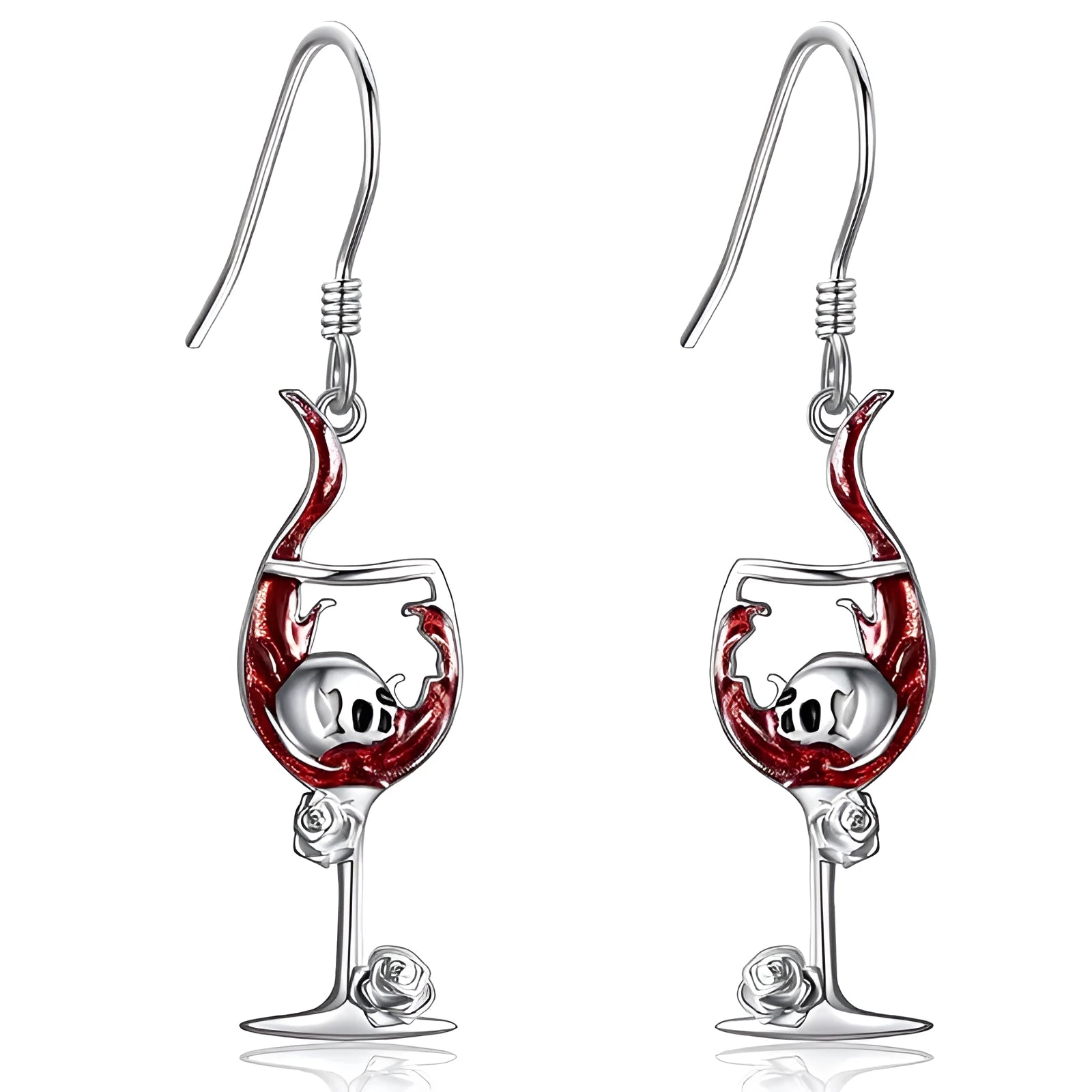 Close-up of a pair of silver-toned geometric earrings combining a skull motif with a wine glass shape.