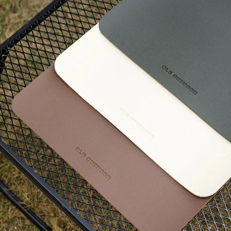 Waterproof heat insulation table mat in army green colour measuring 56×33cm on wooden dining table