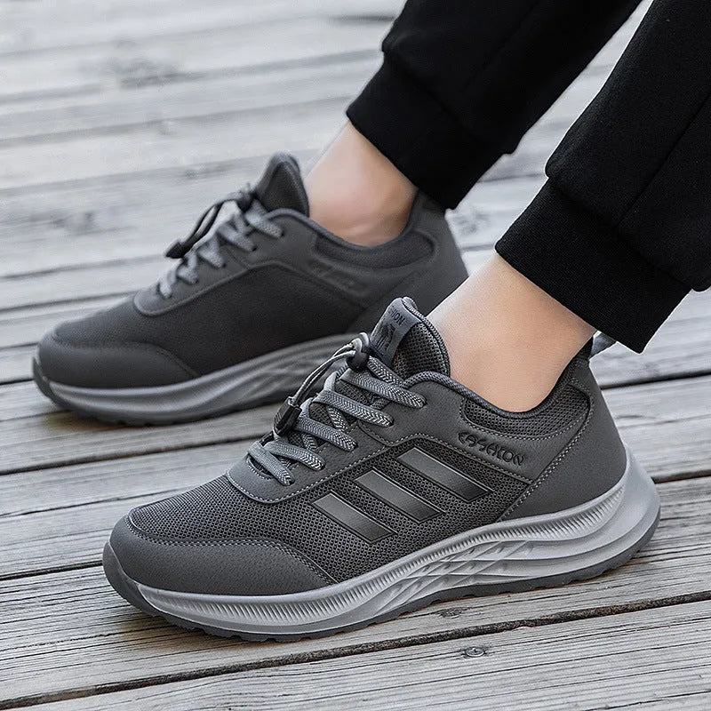 Unisex slip-on casual shoes with mesh upper and elastic band in various colours.