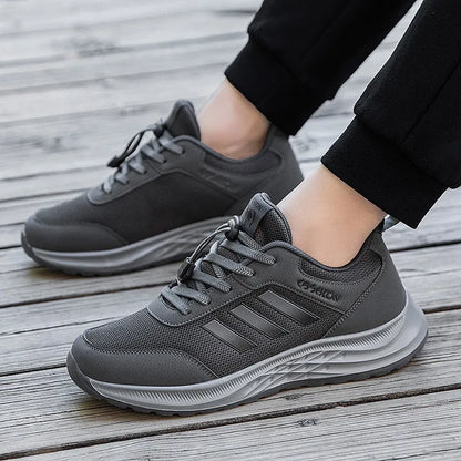 Unisex slip-on casual shoes with mesh upper and elastic band in various colours.